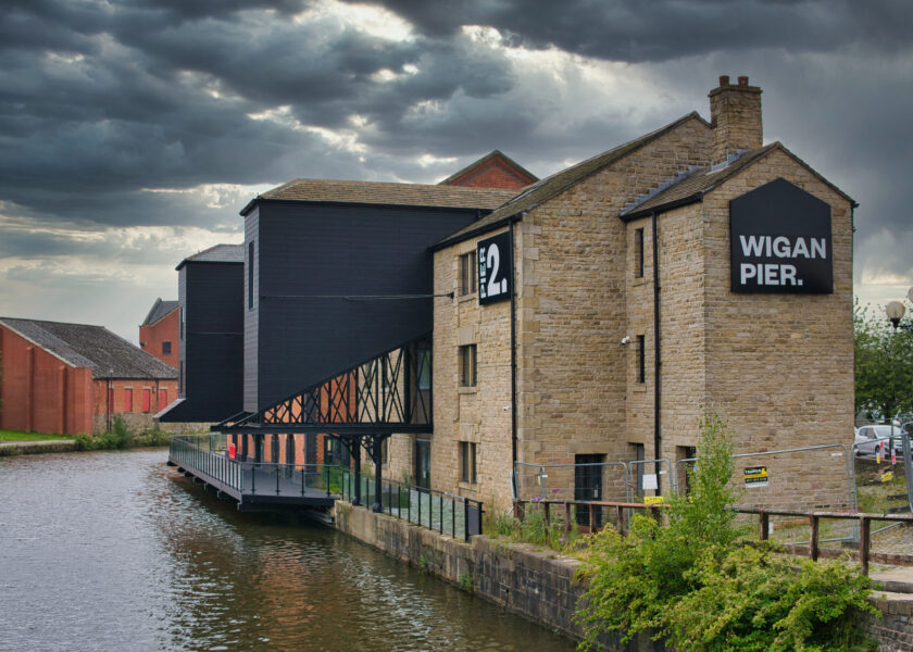 Warehouse buildings at Wigan Pier on the Leeds – Liverpool Canal. Now under redevelopment for housing and public access areas including a food hall and event centre.